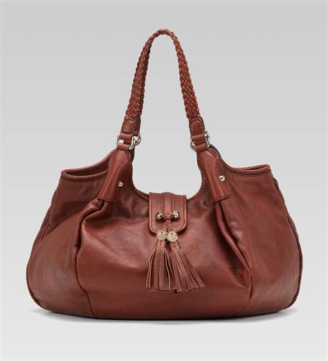 gucci handbags italy|gucci int official website.